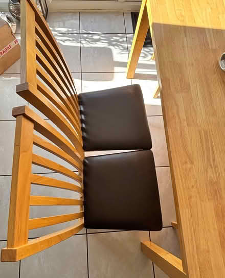Photo of free Oakwood dining table with 6 faux leather chairs (Papworth Everard CB23) #2