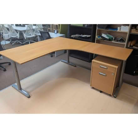 Photo of free Ikea corner table (Macomb area, 24 and Garfield) #2