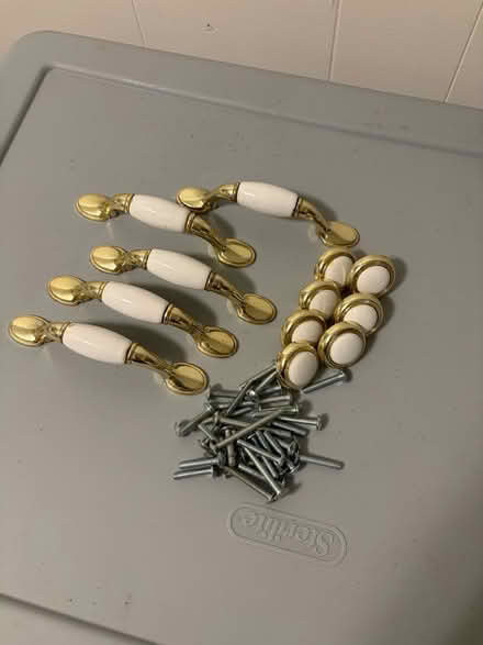 Photo of free Brass & White Cabinet Hardware (Belmont, MA) #1