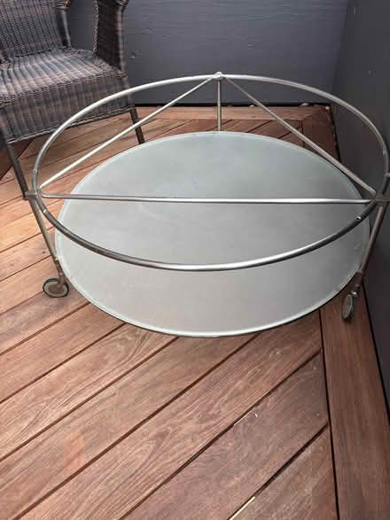 Photo of free round glass coffee table on wheels (Berkeley) #3