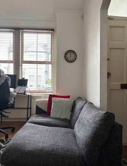 Photo of free Navy grey sofa (Fulham Palace Rd SW6) #4