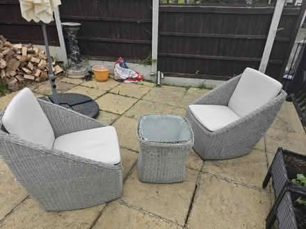 Photo of free Rattan table and 2 chairs (Romford) #1