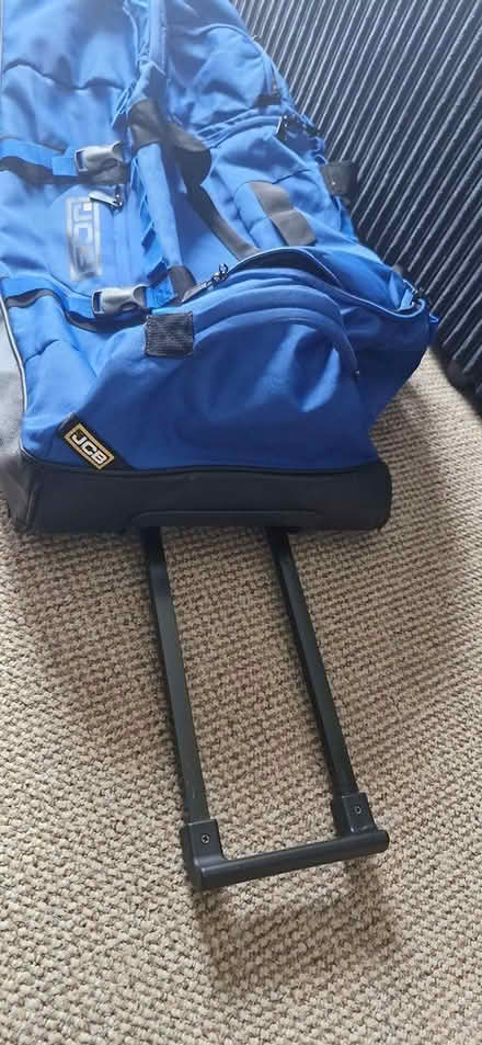 Photo of free Blue JCB holdall on wheels (CH45) #3