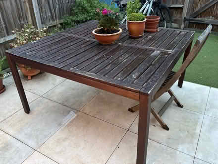 Photo of free Large wooden IKEA table (Emlyn Gardens W4) #1
