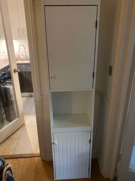 Photo of free White wood tall hallway cabinet (Earls Court SW5) #1