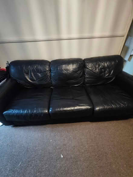 Photo of free Large 3 seater black leather sofa (Dy4 8sz) #1