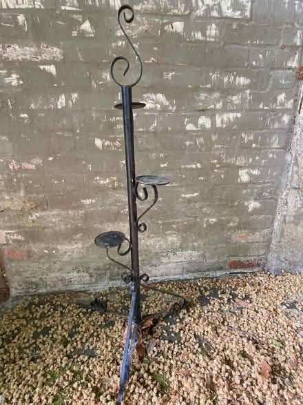 Photo of free Black iron candle stand (Mytchett. GU16) #1