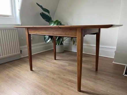 Photo of free Wooden dining table, extendable (W11 2JN) #1