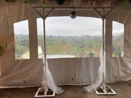 Photo of free Wedding arch - white painted timber (Forest Green GL6) #1