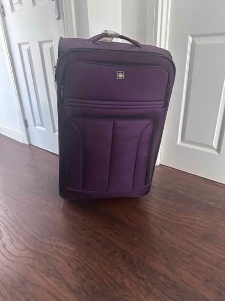 Photo of free Large Suitcase (L14 3NB) #1