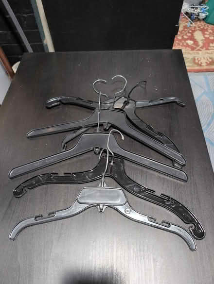 Photo of free Black plastic hangers (Brentwood) #1
