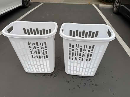 Photo of free 2 identical tall laundry baskets (1075 Valencia Avenue) #1