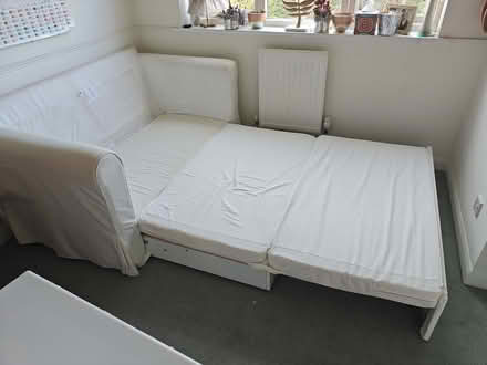 Photo of free White sofa bed. (Send GU23) #3