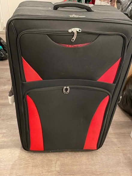 Photo of free Large material suitcases (Wandsworth SW18) #1