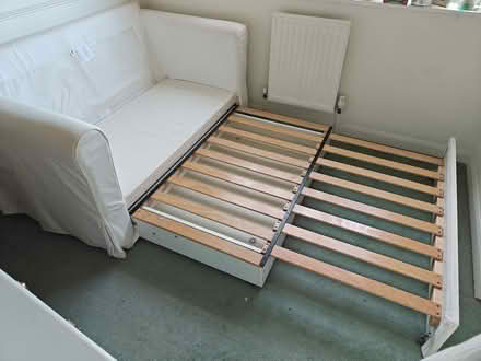 Photo of free White sofa bed. (Send GU23) #4
