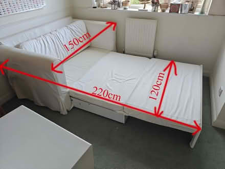 Photo of free White sofa bed. (Send GU23) #1