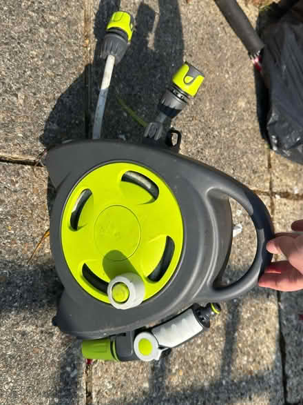 Photo of free Roll up hose and watering can (ME5) #3