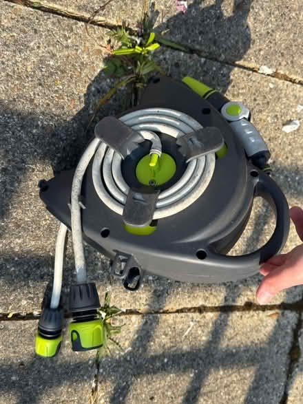 Photo of free Roll up hose and watering can (ME5) #1