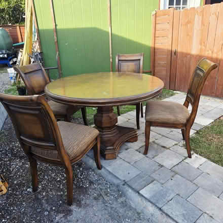 Photo of free Dinning room set. 4 chairs (Deltona cottondale dr.) #1