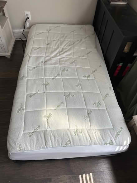 Photo of free Trundle with rolling frame (West Cary, Ridgefield Farms) #1