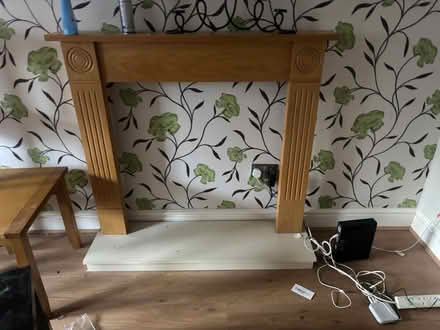 Photo of free Red leather couch and wooden mantel (West Lancashire WN8) #1
