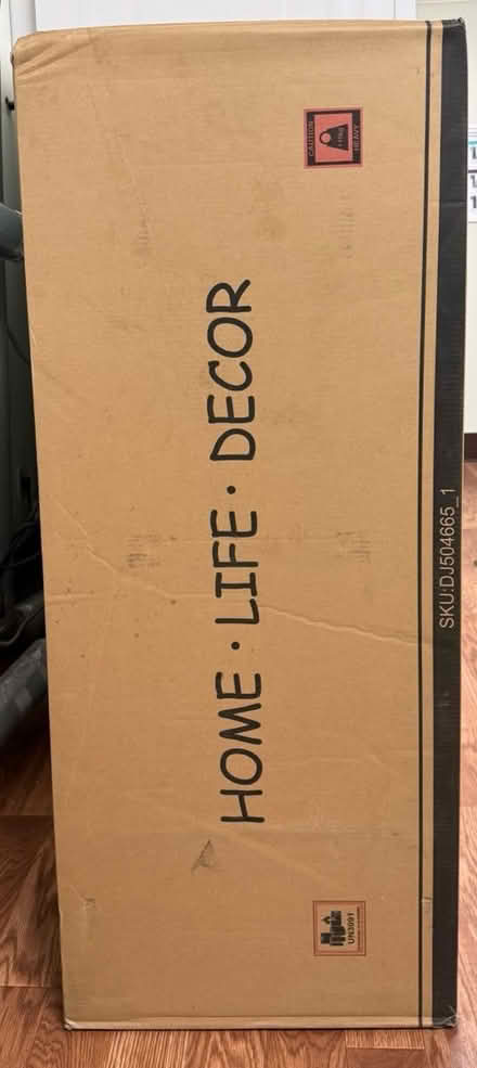 Photo of free Tall, sturdy cardboard box (1075 Valencia Avenue) #1