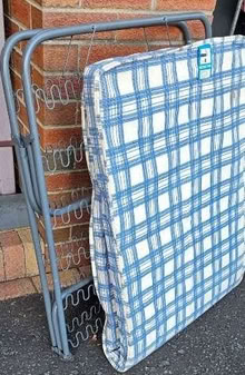 Photo of free Small foldable bed frame and mattress (Magheralave BT28) #1
