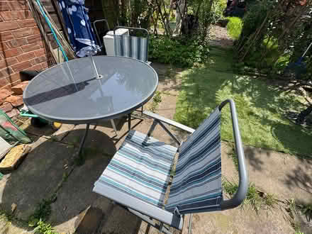 Photo of free Glass top round table, 2 fold up chairs, parasol & cover (Davenham CW9) #2