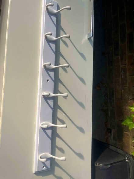 Photo of free White wooden 6 coat hanger (68 cm) (Esher KT10) #1