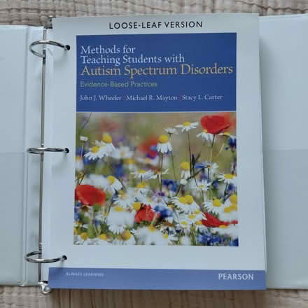 Photo of free Loose leaf textbook in binder (Union City) #1