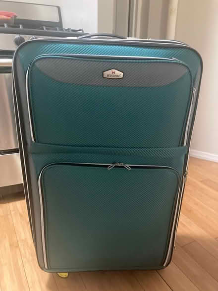Photo of free Large New Spinner Suitcase (Hells Kitchen) #1