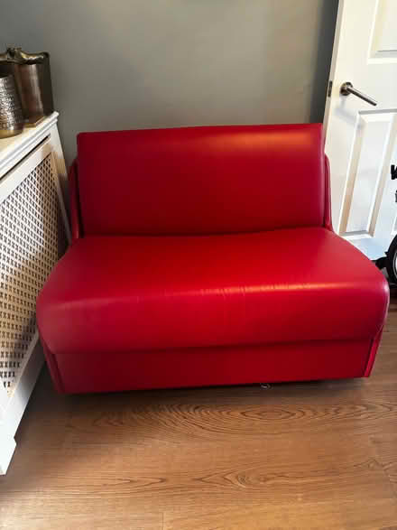 Photo of free Sofa bed red real leather (Wimbledon SW19) #1