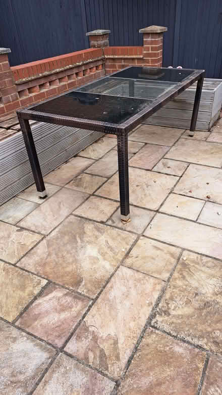 Photo of free Glass topped outdoor table (Walpole St Andrew PE14) #1