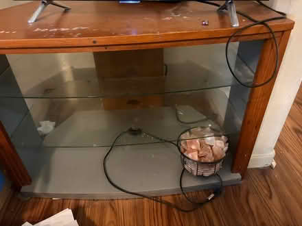 Photo of free Wood and glass tv/av center (NE Kingwood) #1