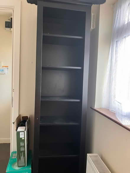 Photo of free Tall Black Wooden Shelf (Sandyford, Dublin 18) #1