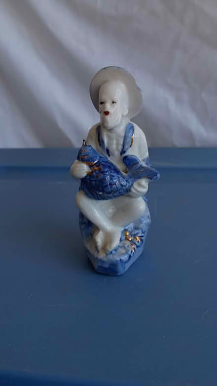 Photo of free Ceramic fisherman statue (Villages of Rolesville) #1