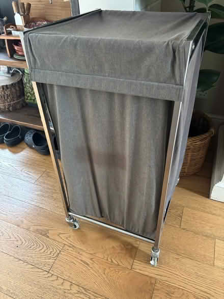 Photo of free Grey IKEA laundry basket on wheels (Giffnock G46) #2