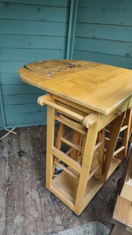 Photo of free Fold out table 2xstow away stools (Wessex Road SN14) #1