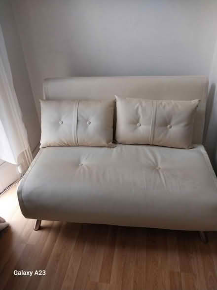Photo of free 2 seater white faux futon couch (Bayswater W2) #1
