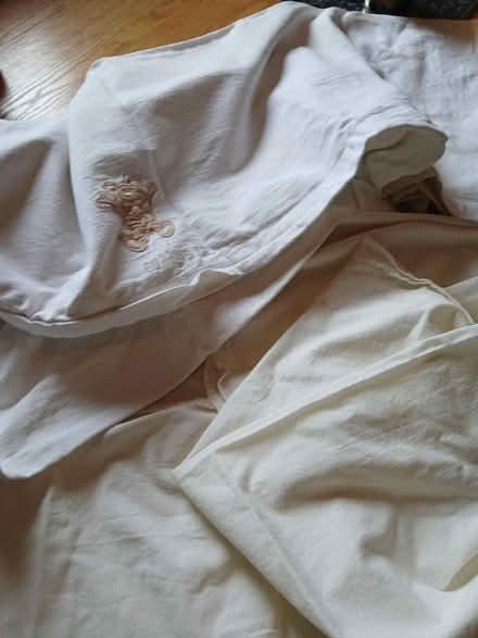 Photo of free 2 flat cotbed sheets (Parkhead EH11) #1