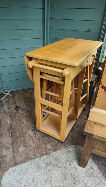 Photo of free Fold out table 2xstow away stools (Wessex Road SN14) #3