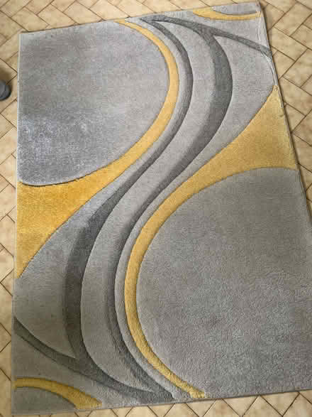 Photo of free Dunelm 'Mirage' rug in ochre, 120 x 170cm (Churchstoke SY15) #1