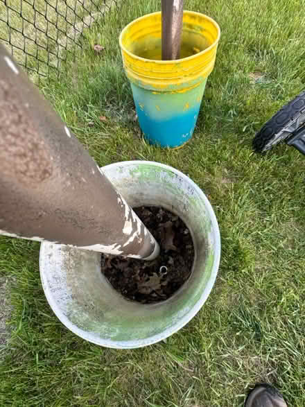 Photo of free Concrete planter buckets w/PVC pole (Cement City) #3