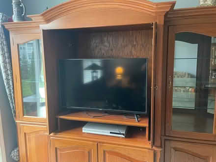 Photo of free Entertainment hutch/curio (Near Rt 25 $ Rt 56) #1