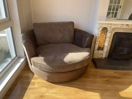 Photo of free Swivel love couch (Bawnville Tallaght Dublin 24) #1