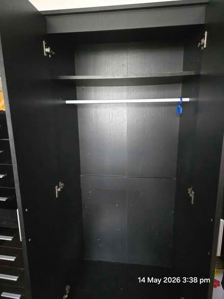 Photo of free Tall black hi gloss cupboard (Northfield Ealing) #2