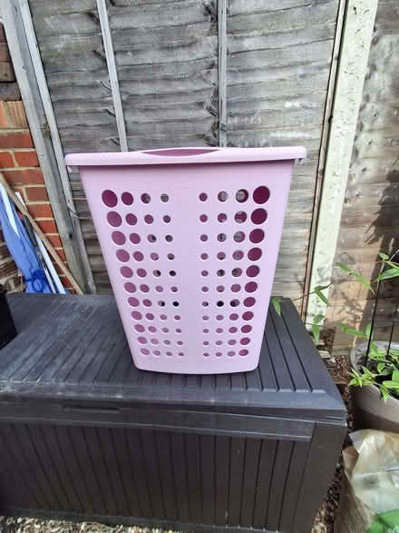 Photo of free 'Curver' half size laundry basket. Pinky/Lilac, slight (Otford TN14) #1