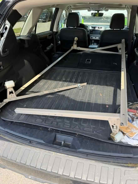Photo of free Twin Metal Bed Frame with Wheels (West Roxbury) #1