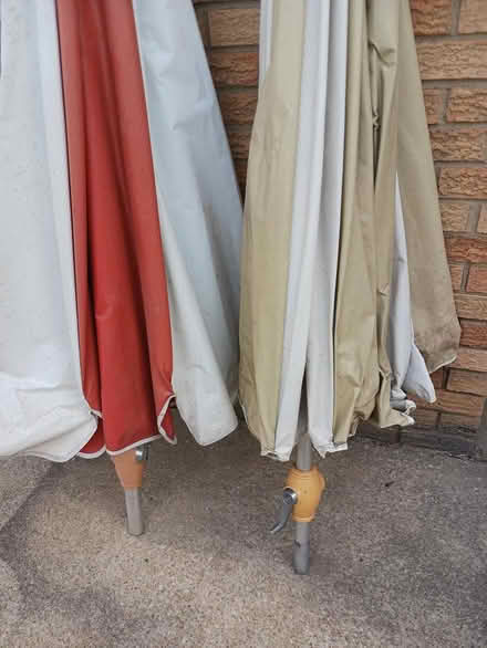 Photo of free 3 large patio umbrellas 🌂 (Near Summit Mall) #1