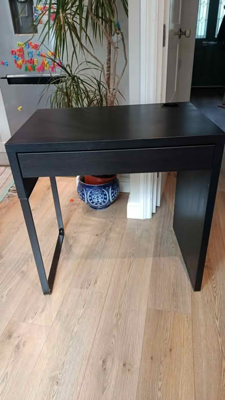 Photo of free Ikea black desk (Kingston upon Thames) #1